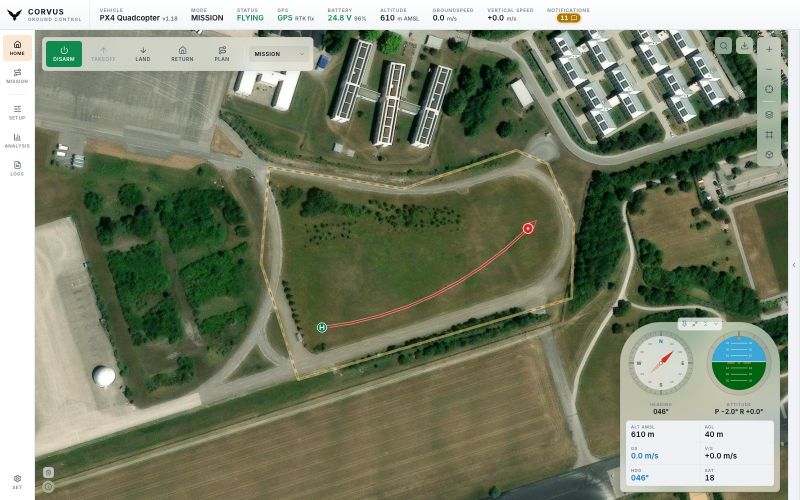 The Home map during a flight with the side panel collapsed: the geofence drawn as a dashed amber outline around the field, the flown track inside it and the instrument panel.